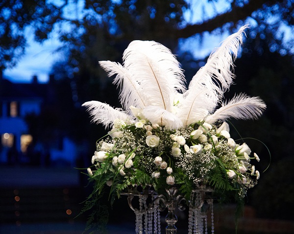 white flowers and feathers